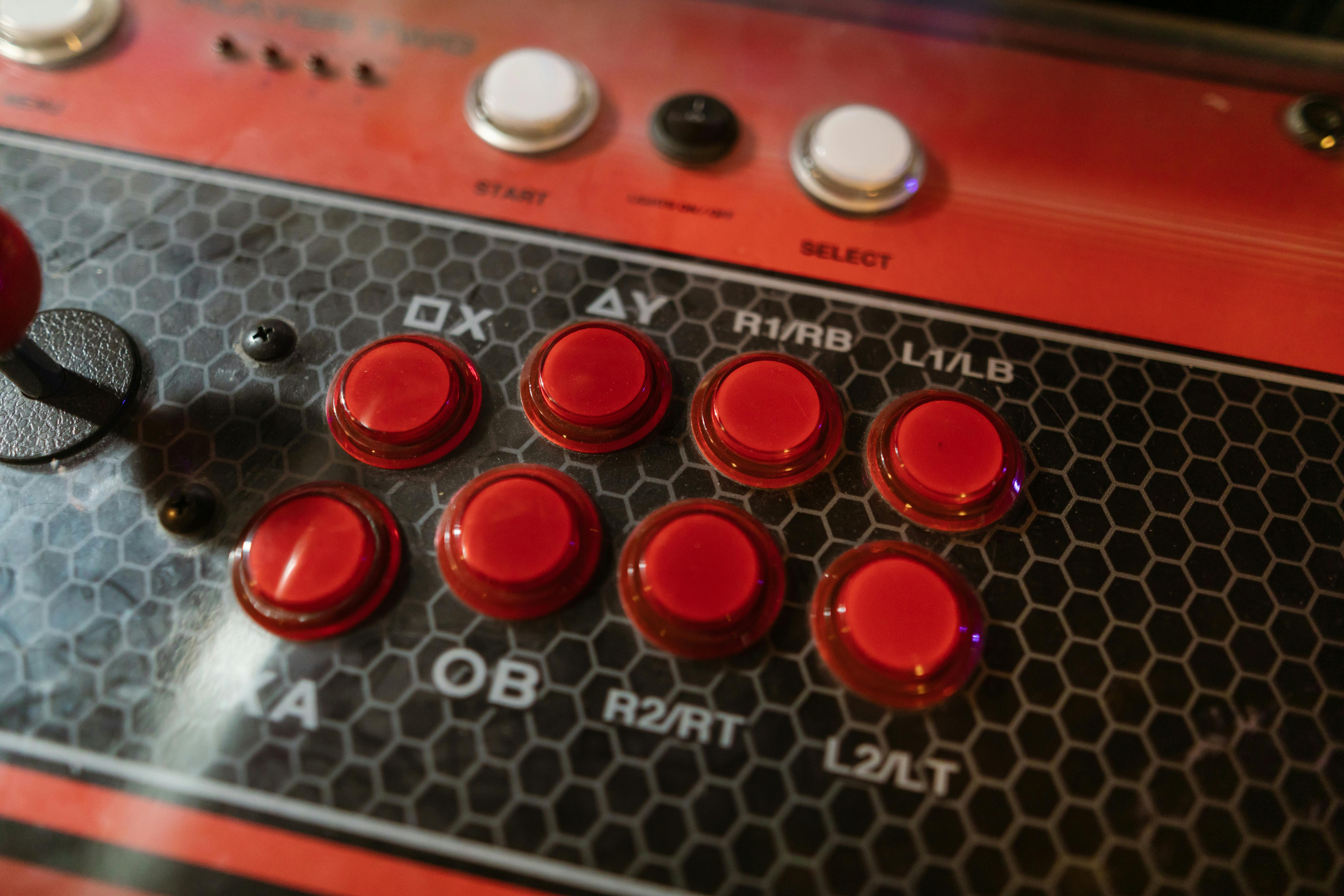 Close-Up View Of Control Buttons Of An Arcade Machine · Free Stock Photo