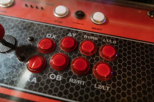 Close-Up View of Control Buttons of an Arcade Machine