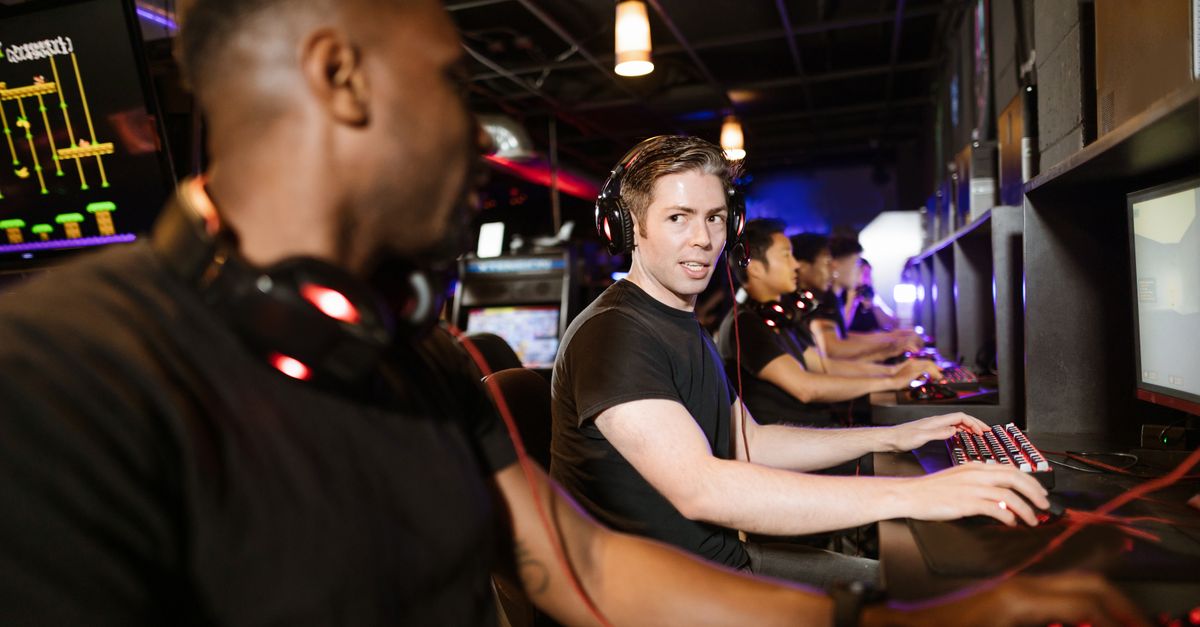 Men Playing Computer Games · Free Stock Photo