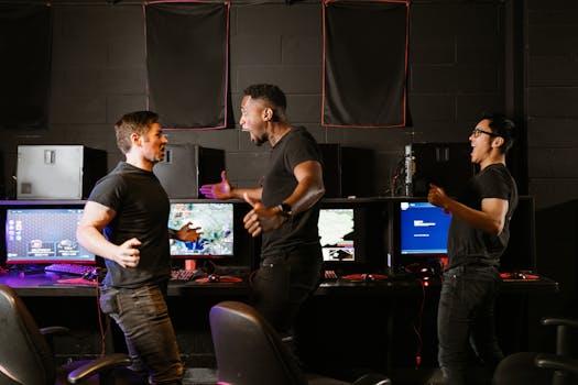 Enthusiastic group of diverse friends celebrating a gaming victory in an esports setting.