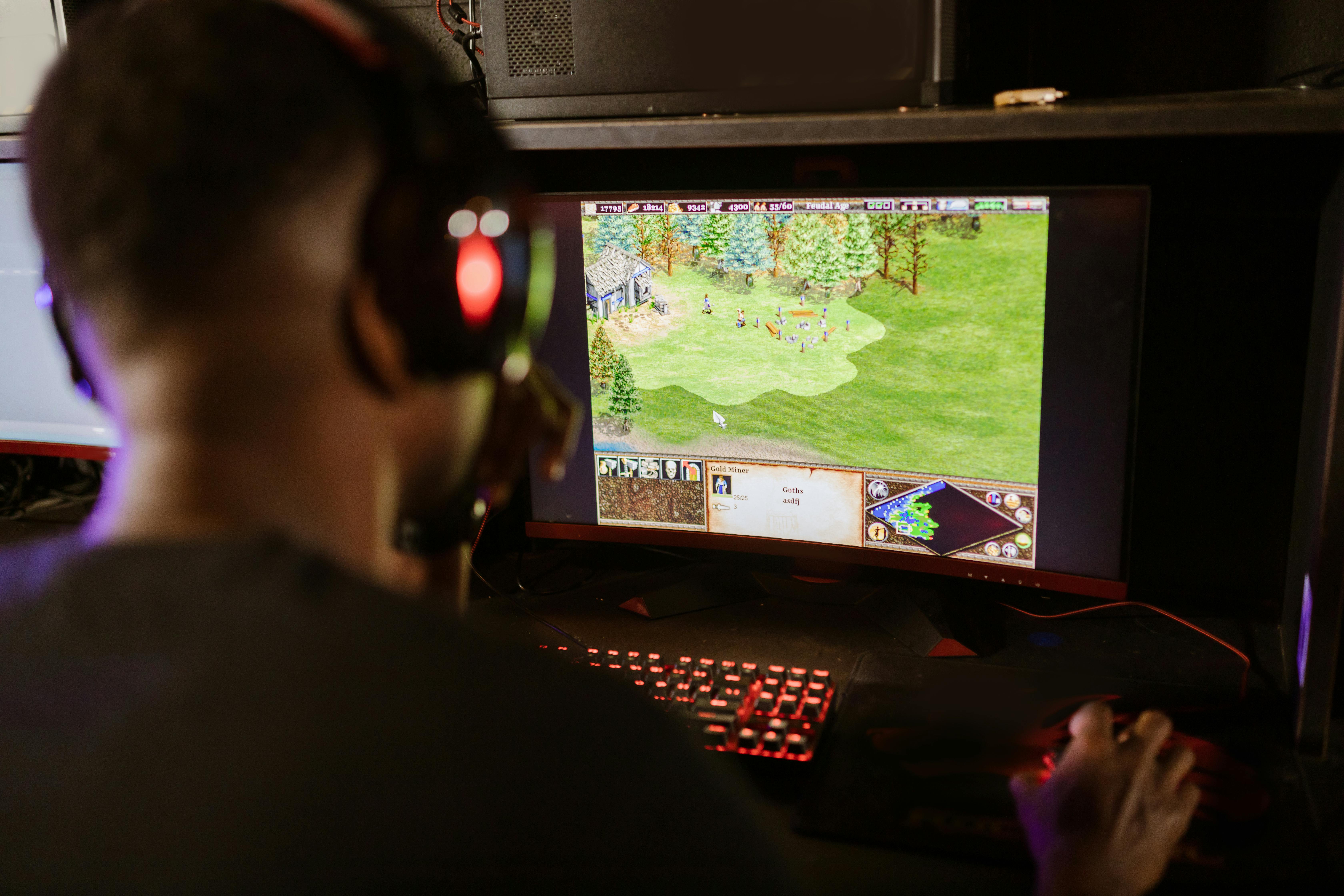 man playing computer game