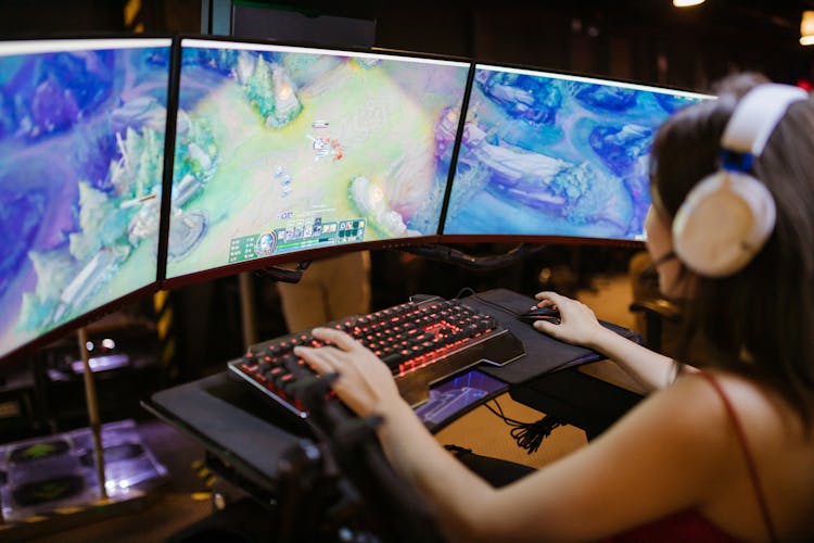 A Woman Playing League Of Legends