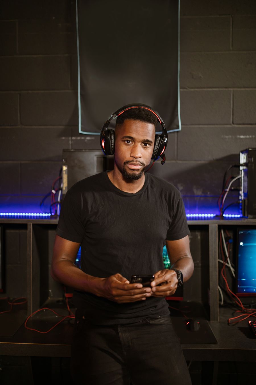 Milo 'Ember' Raines, entry duelist and captain, in his headset