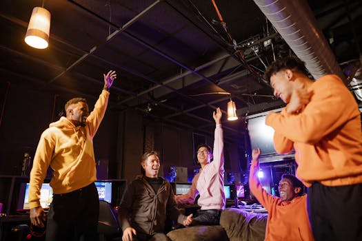 A group of friends celebrate a victory in a vibrant gaming lounge, embracing teamwork and technology.