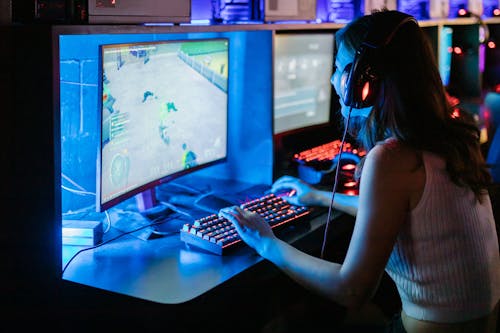 Free Woman Playing Computer Game Stock Photo