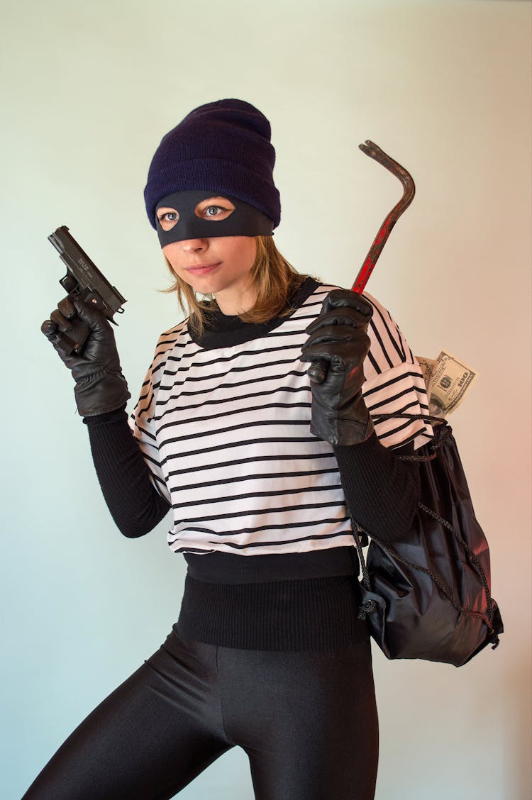 A Woman Wearing Robber Costume