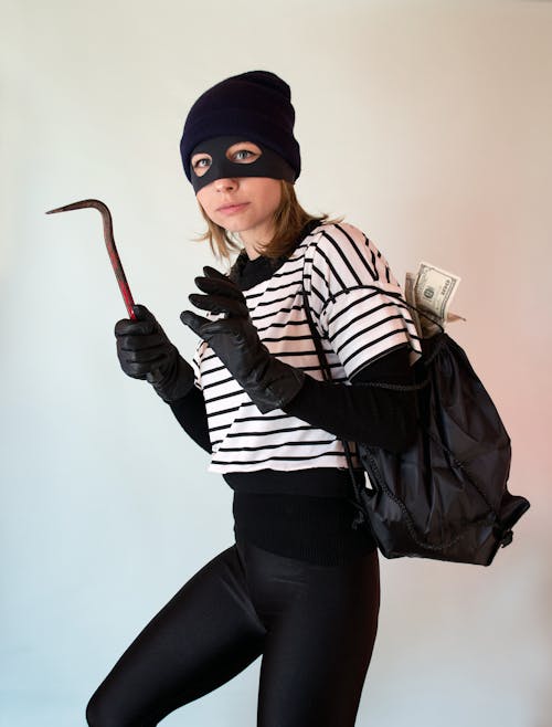 Free A Woman Wearing Robber Costume Stock Photo
