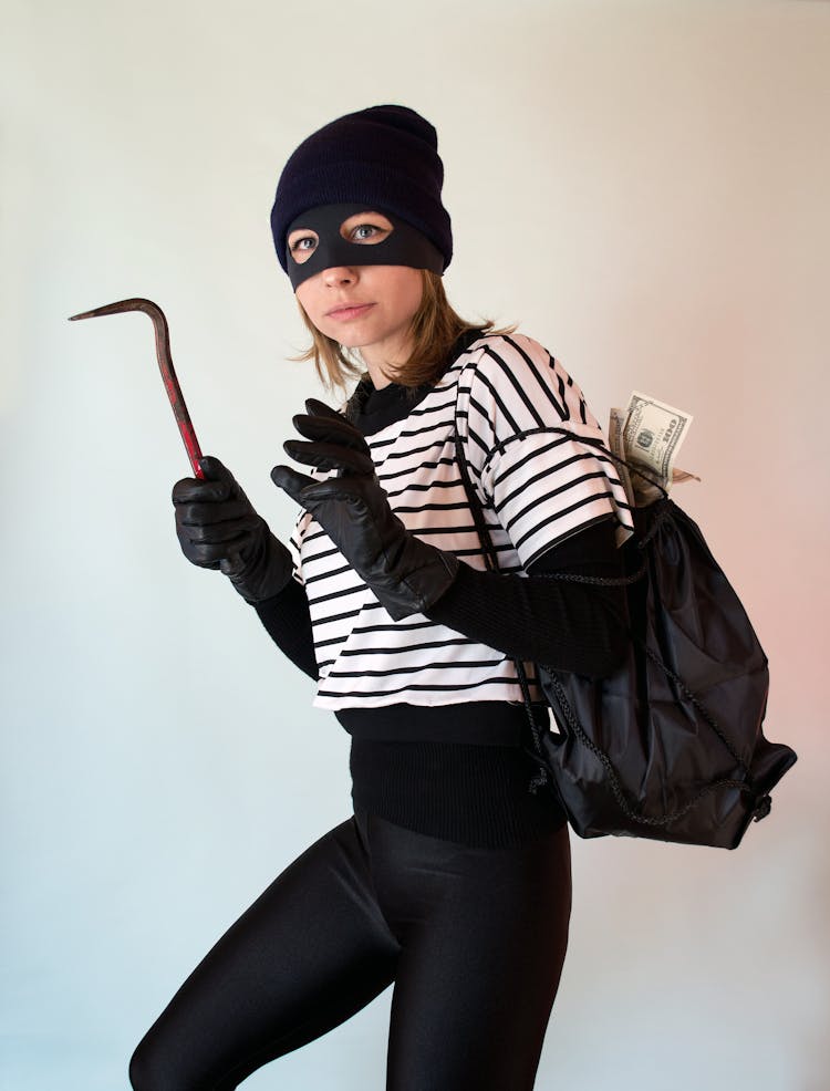 A Woman Wearing Robber Costume