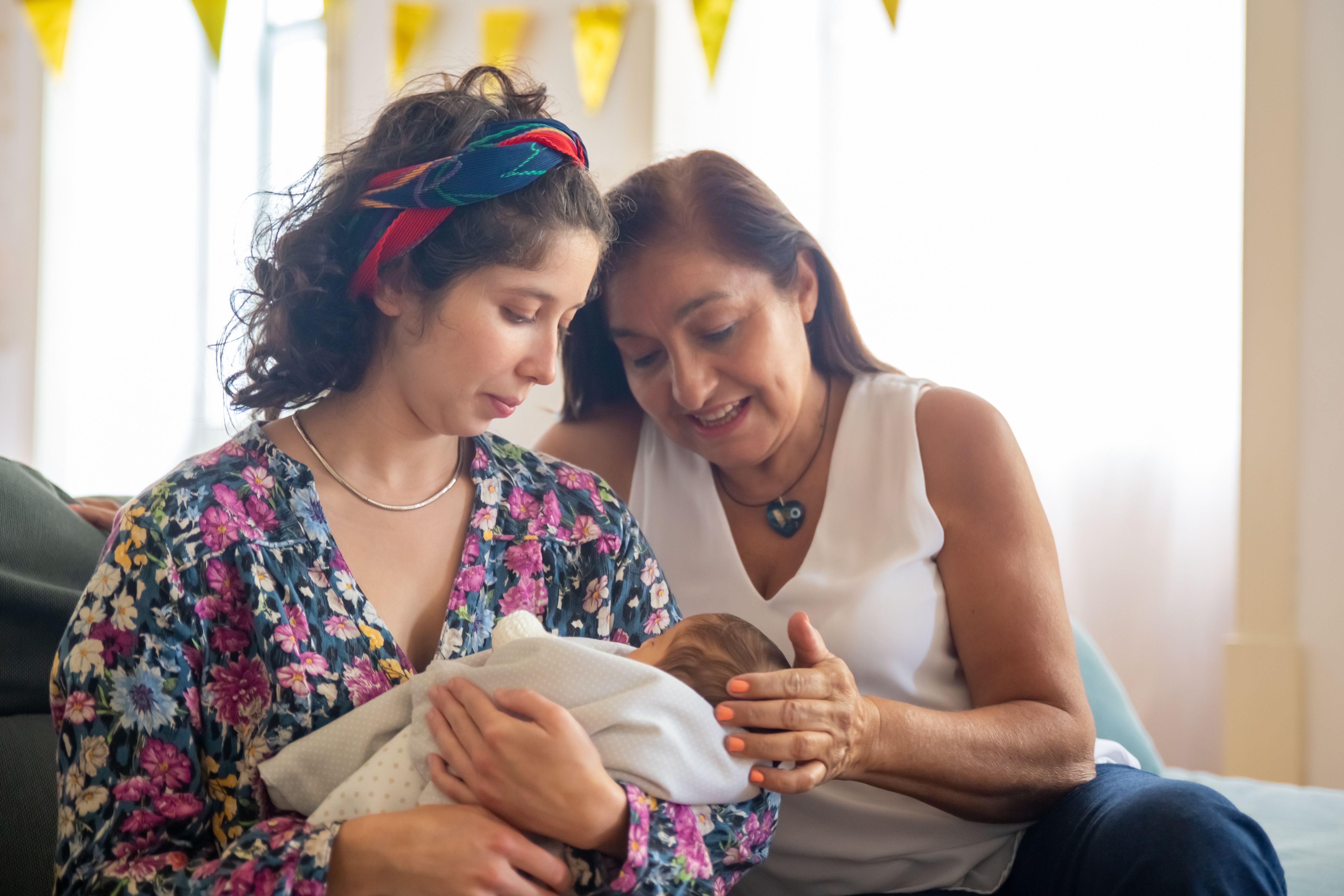 Parent receiving calm postnatal support at home