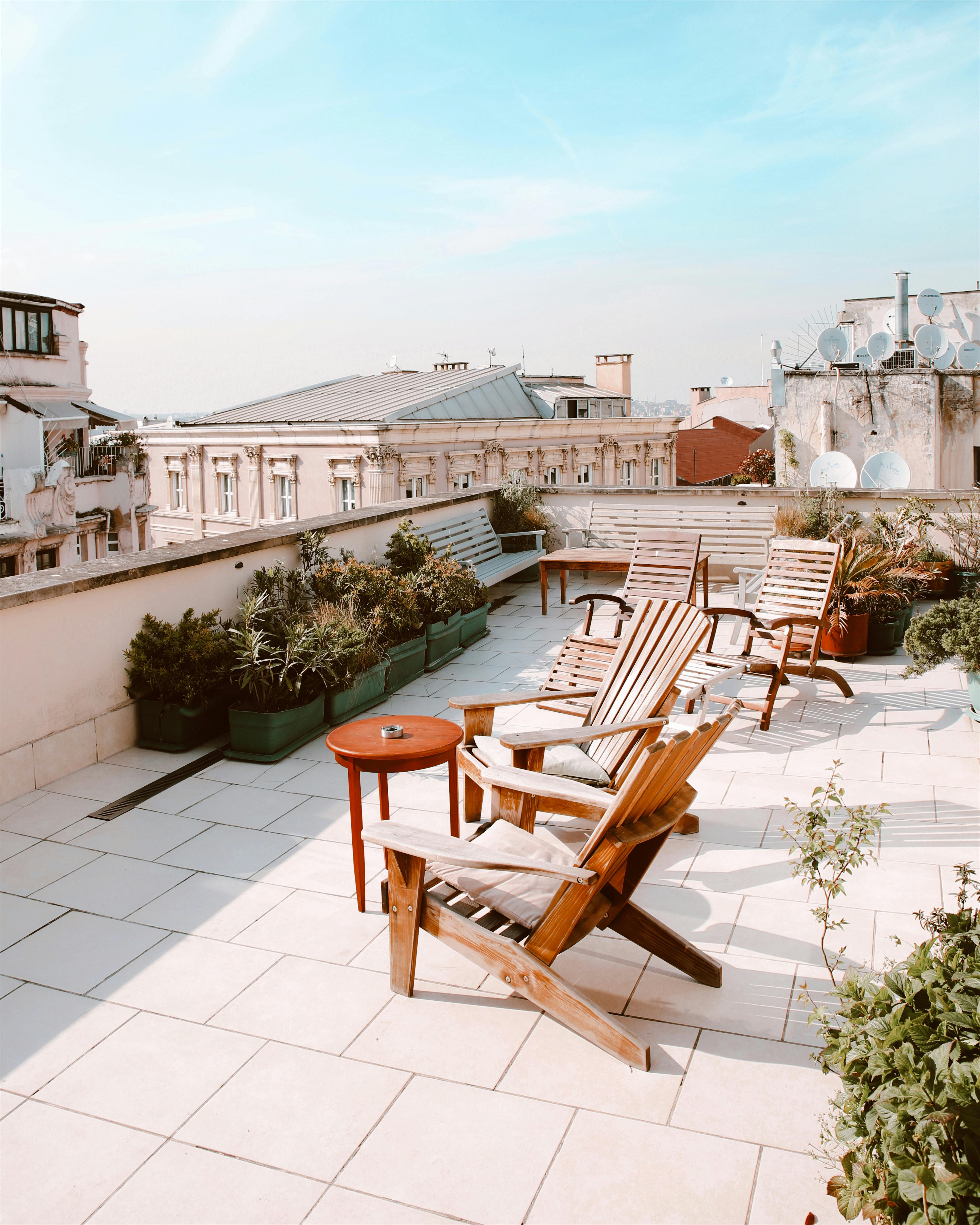 Wooden Chairs on the Roof Top · Free Stock Photo