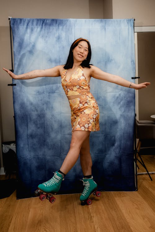 Woman Wearing Roller Skates in a Studio