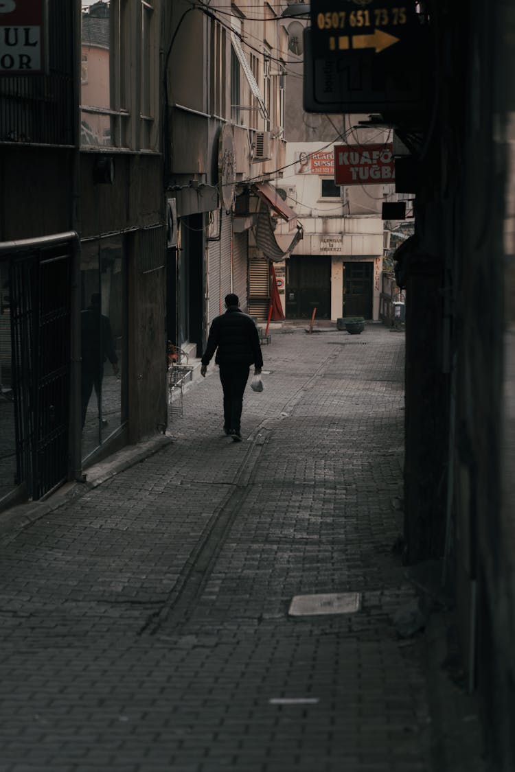 Person Walking Dark Empty City Street