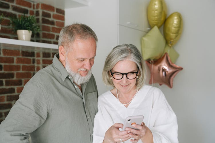 An Elderly Couple Having A Video Call