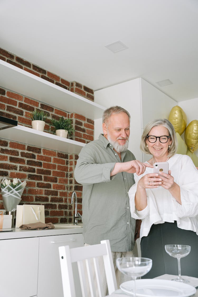 An Elderly Couple Having A Video Call