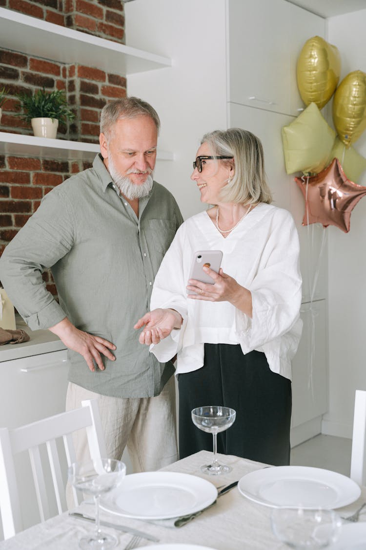 An Elderly Couple Having A Video Call