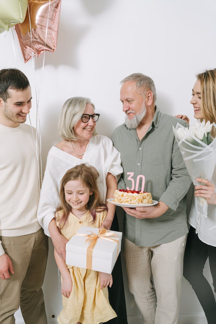 A Happy Family Celebrating A Birthday