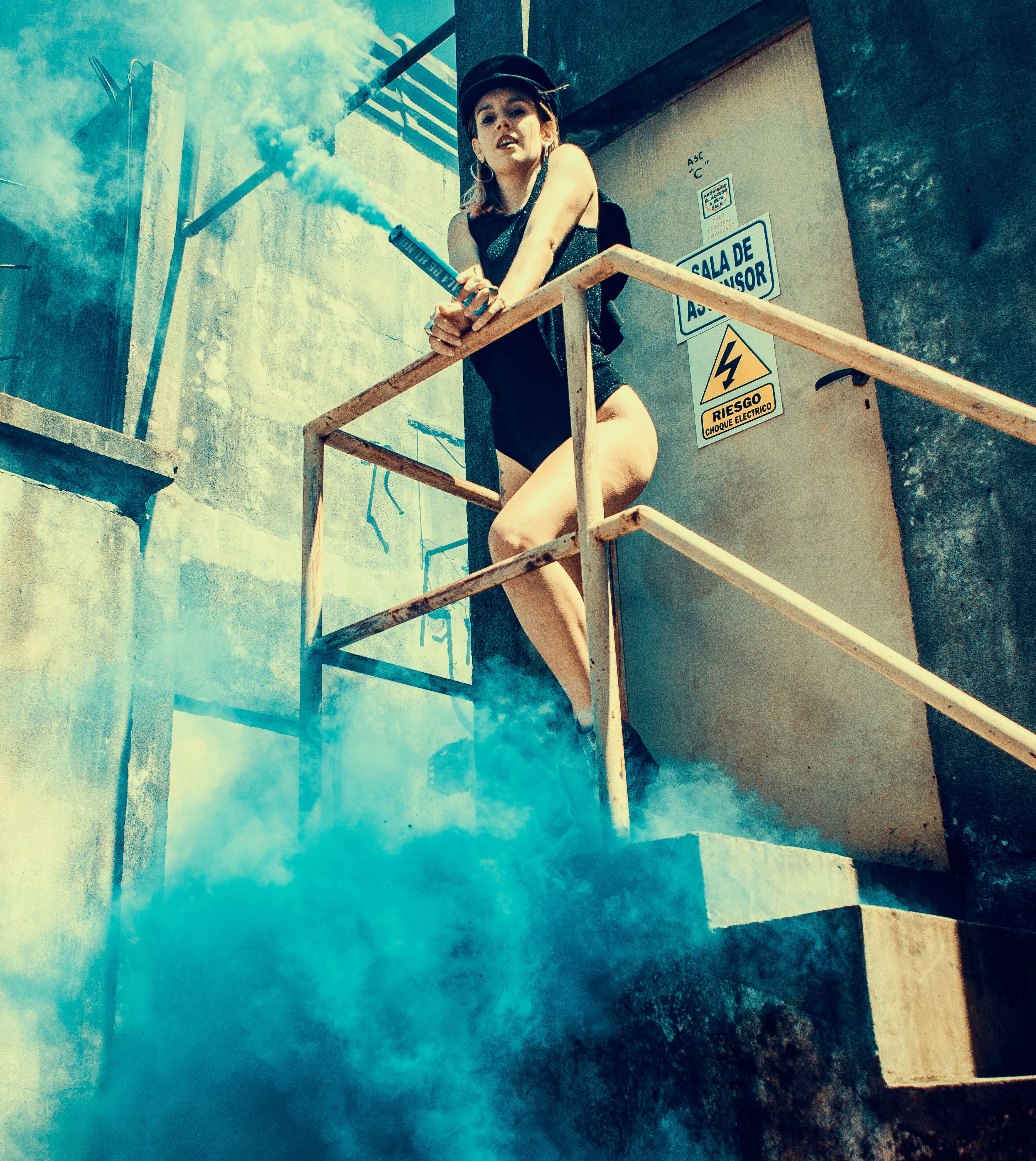 Woman in Black One Piece Swimsuit on Stairs · Free Stock Photo