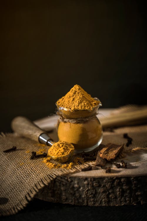 Yellow Powder in Glass Cup