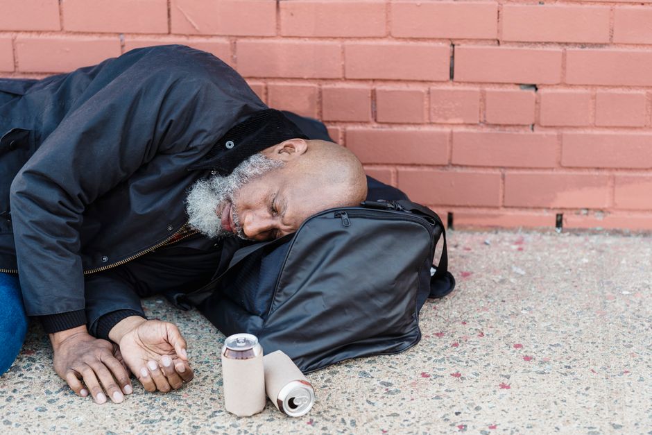 Homeless person on sidewalk