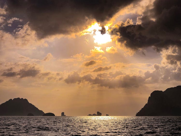 Sun Rays Over Sea With Islands