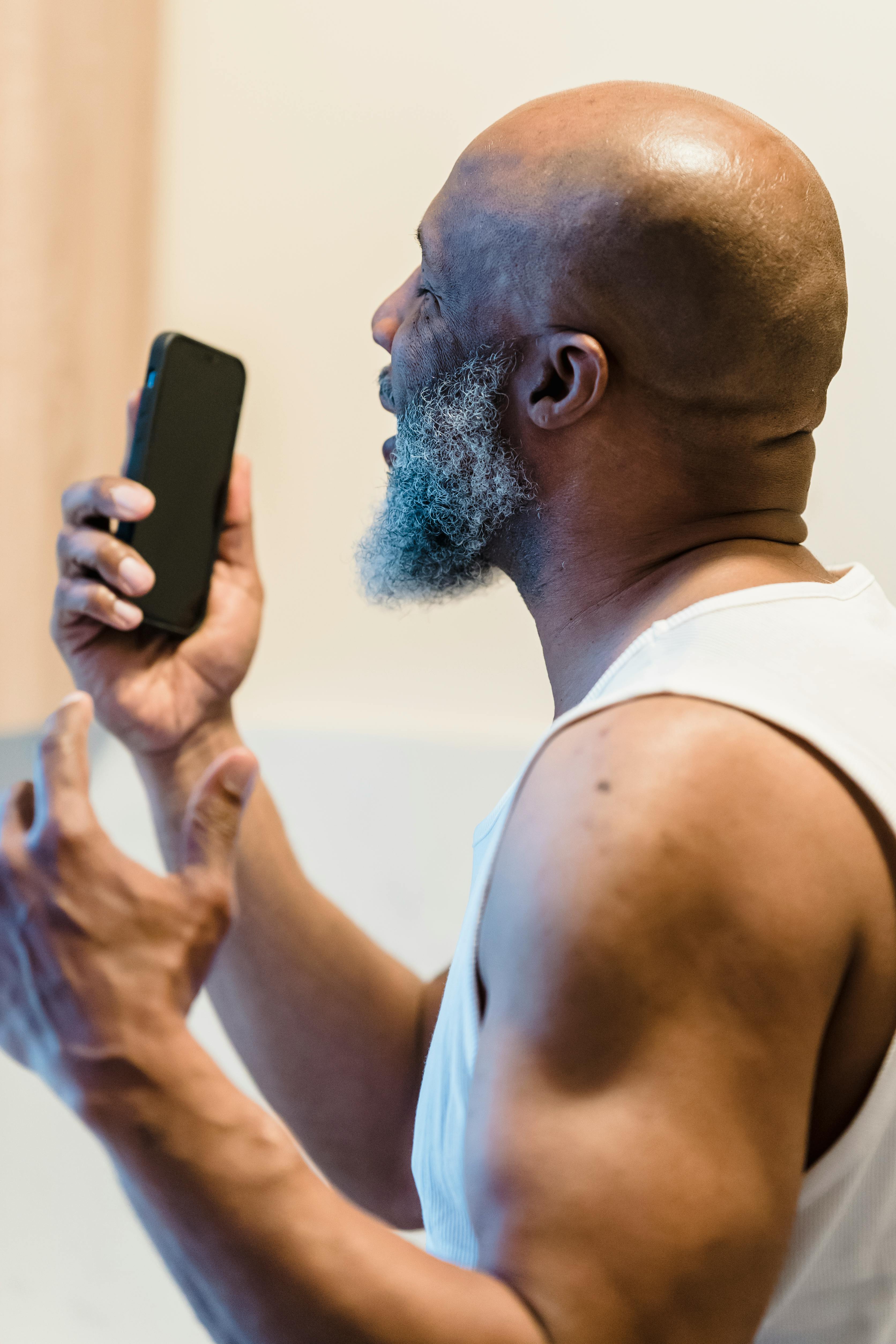 man enjoying smart phone