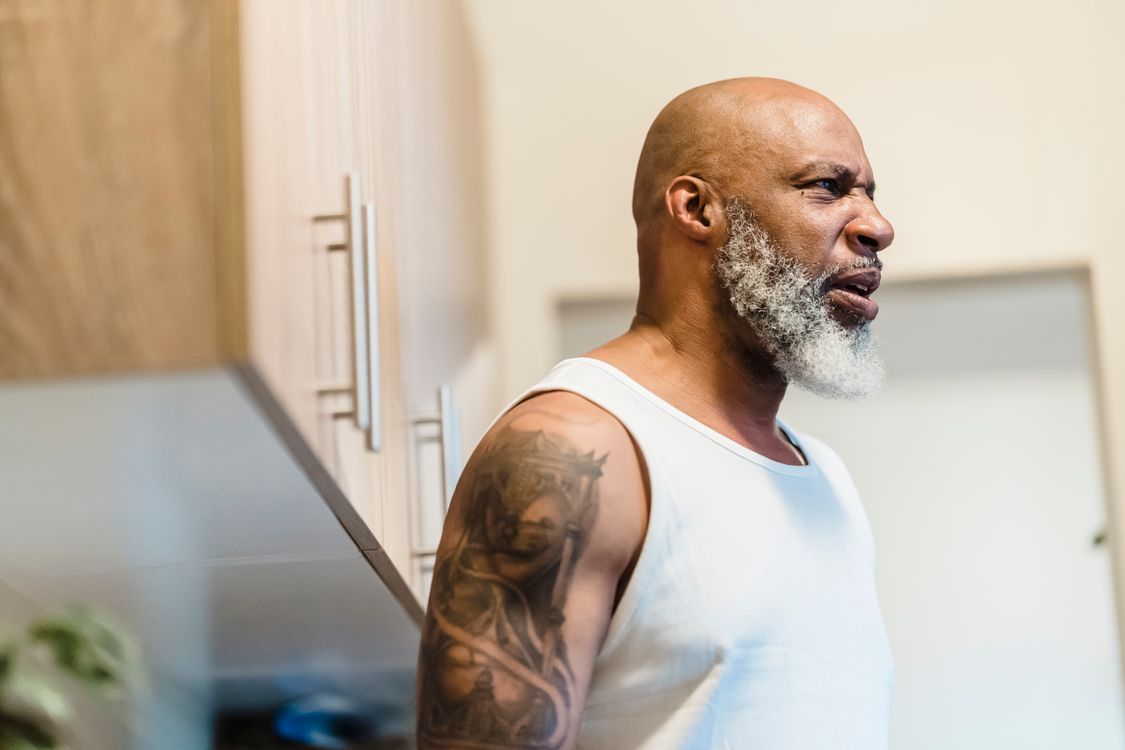 Bald Man with Tattoo · Free Stock Photo