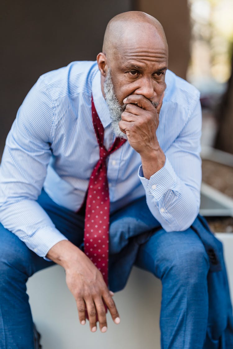 Unhappy Old Man In Suit Thinking