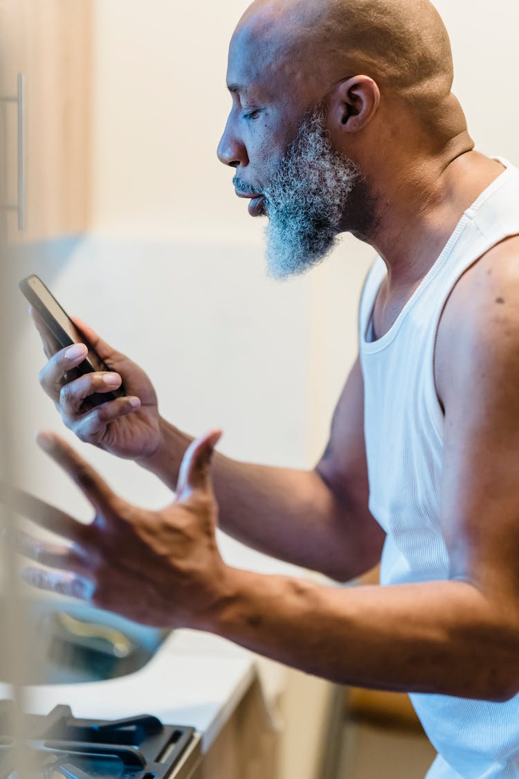 Angry Old Man Arguing On Phone