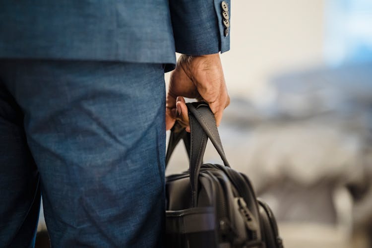 Man With A Briefcase In His Hand 