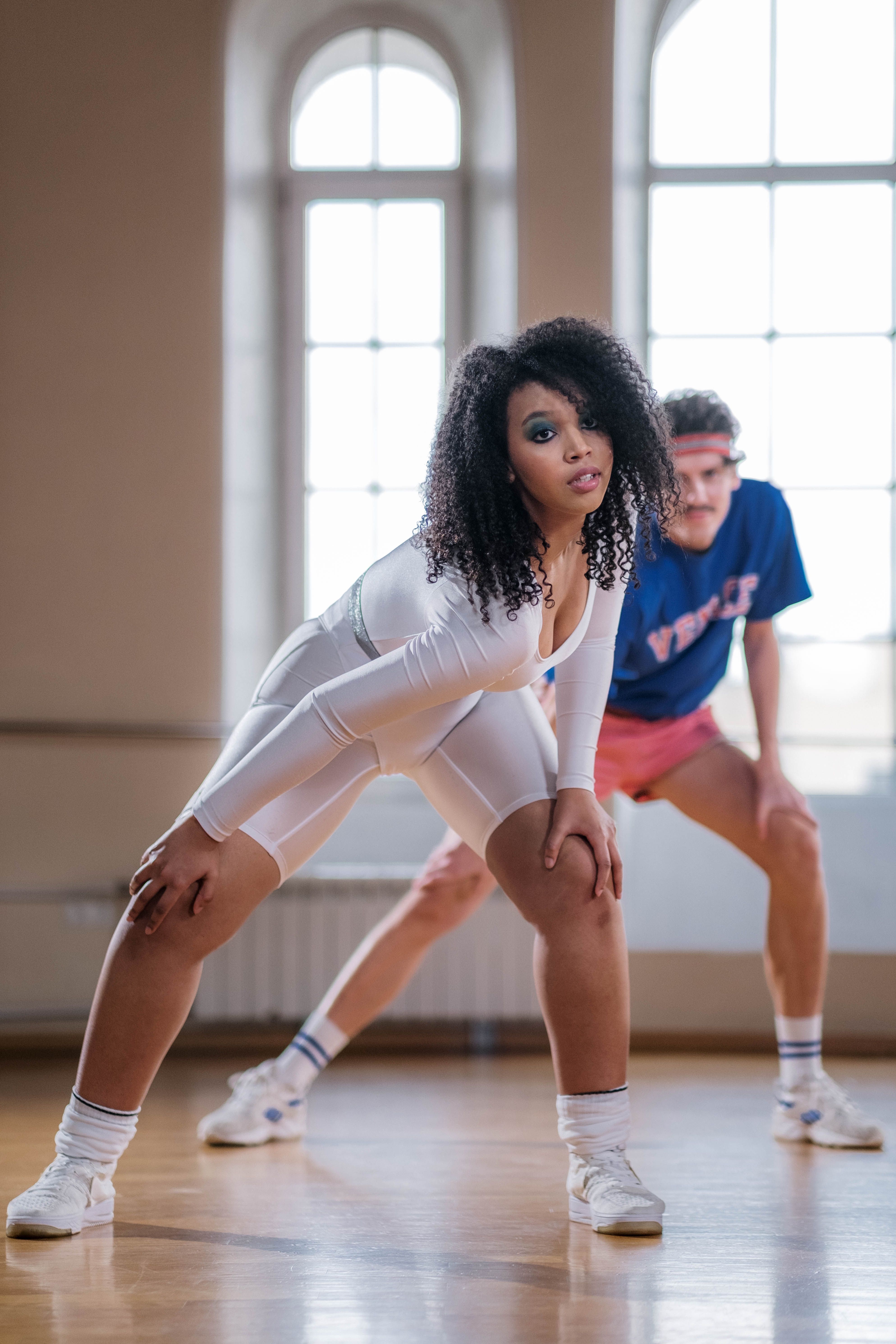 Woman in White Leotard Exercising · Free Stock Photo