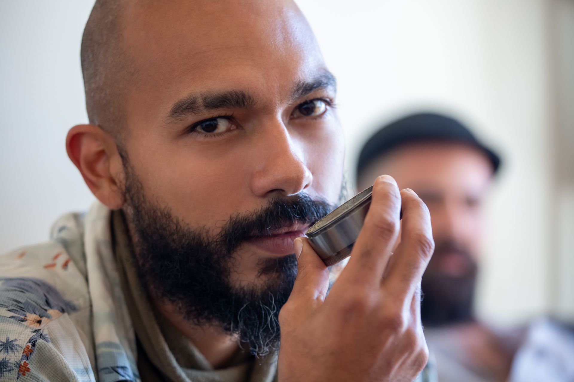 A Man Holding a Canister