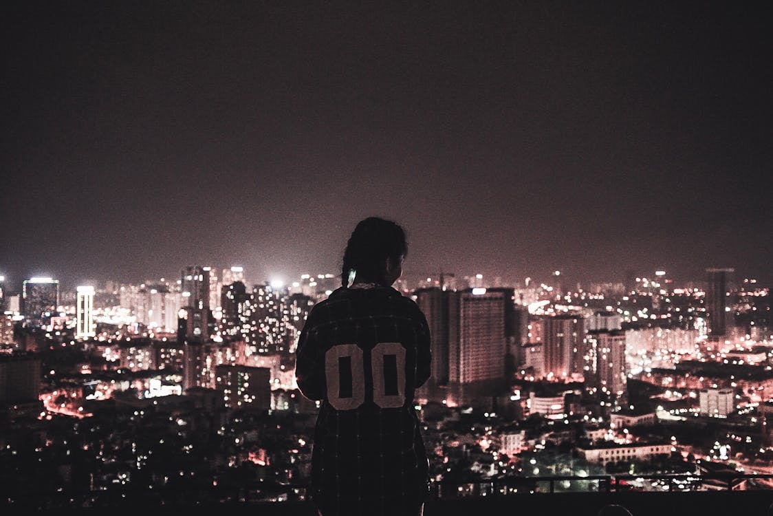 Photo of a Person Watching over City Lights during Night Time · Free ...