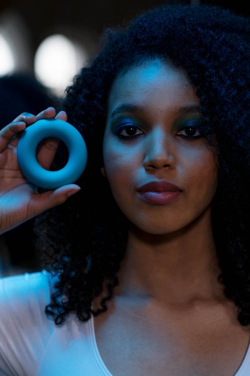 Woman Holding Blue Donut Shape Clay