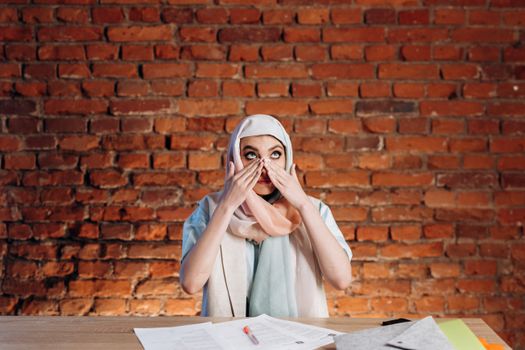 Woman Wiping Tears from her Face