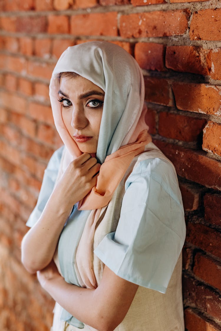 A Sad Woman Wearing A Hijab