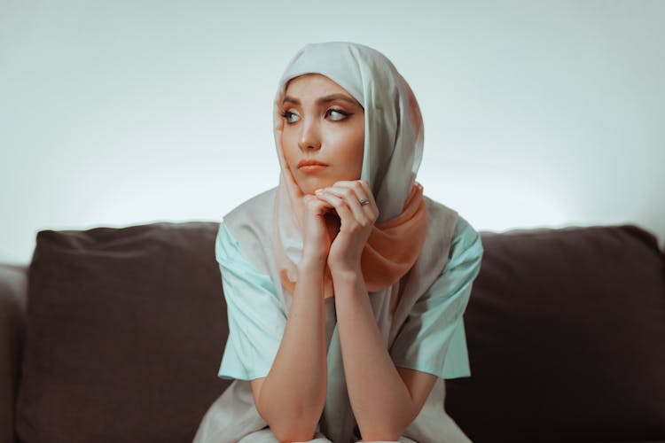 
A Sad Woman Wearing A Hijab