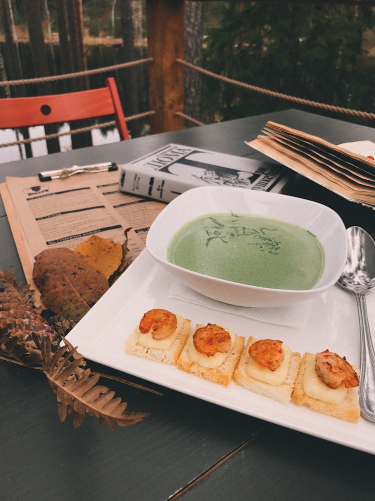 Soup And Sandwiches Served In A Restaurant 