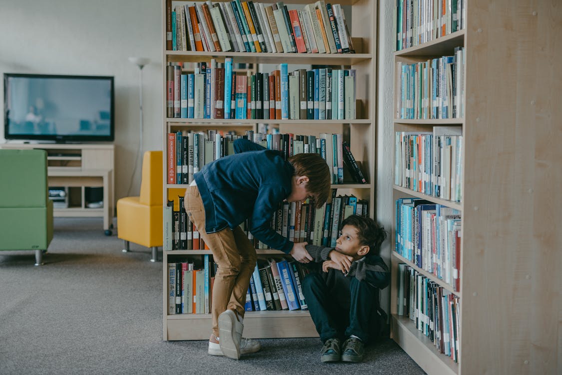 Free A  Kid Getting Bullied in the Library Stock Photo