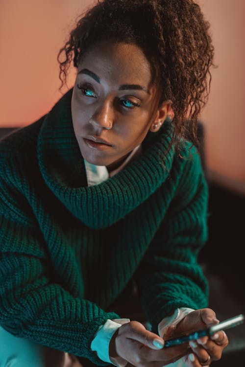 A Woman in Green Turtleneck Sweater