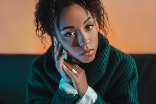 A Woman in Green Sweater