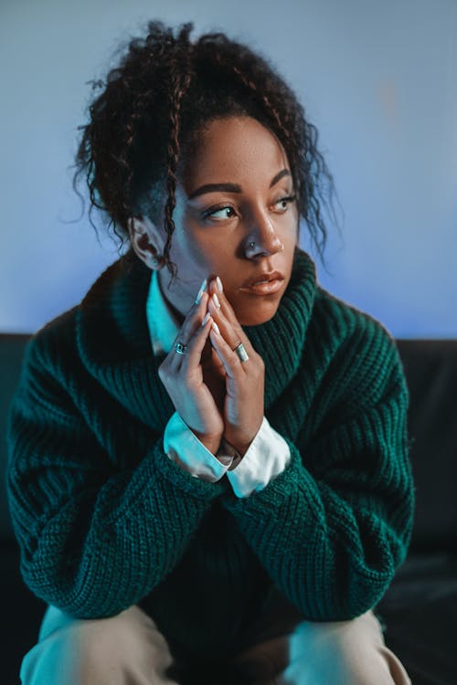A Woman in Green Sweater