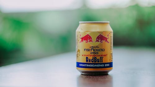 Free Close-up Photography of Red Bull in Can Stock Photo