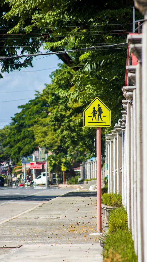 Yellow and Black Road Sign