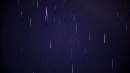 Star trails over a night sky — photo by Nothing Ahead on Pexels