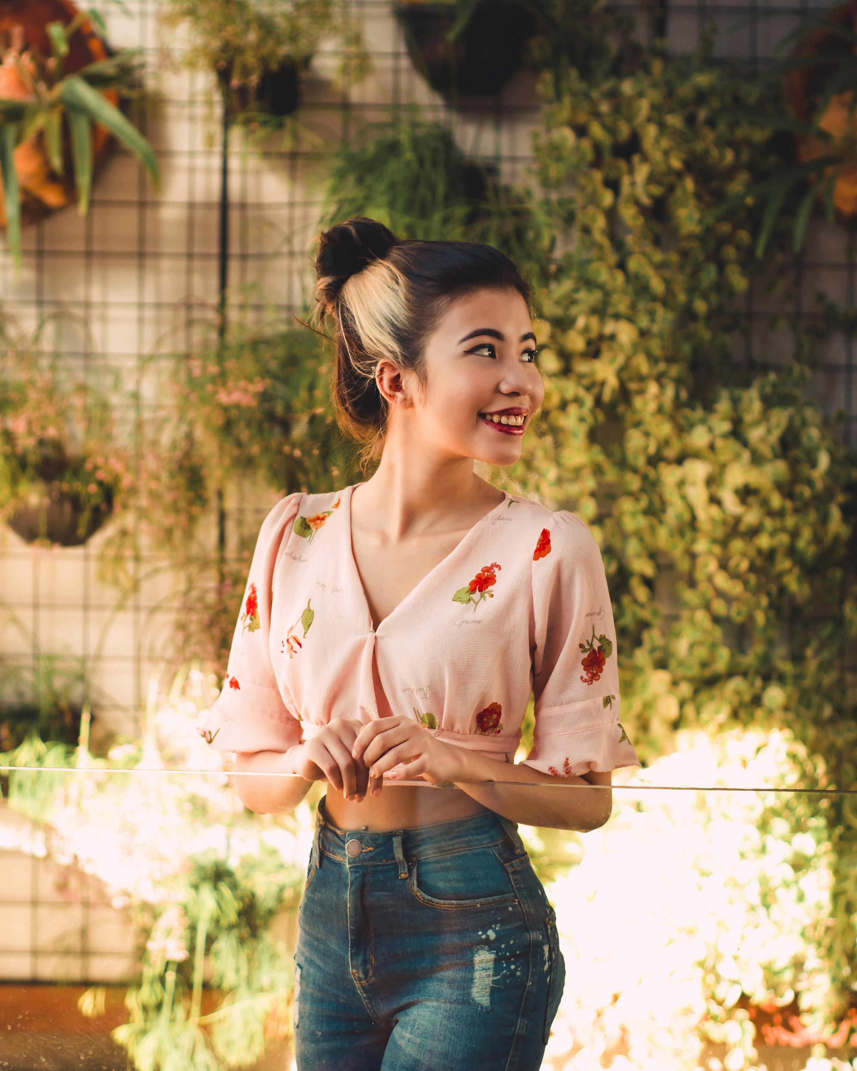 Woman in Pink Crop Top Sweater Posing Beautifully at the Camera · Free ...