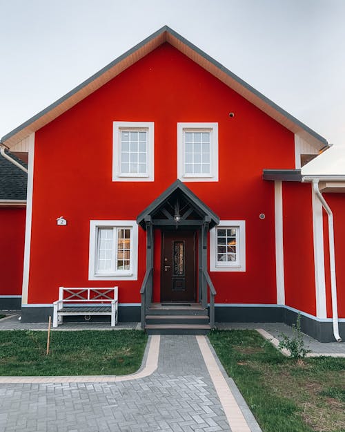 Free A Red House with White Trim Stock Photo