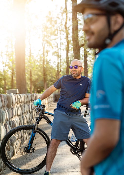 A Man Leaning on His Bicycle