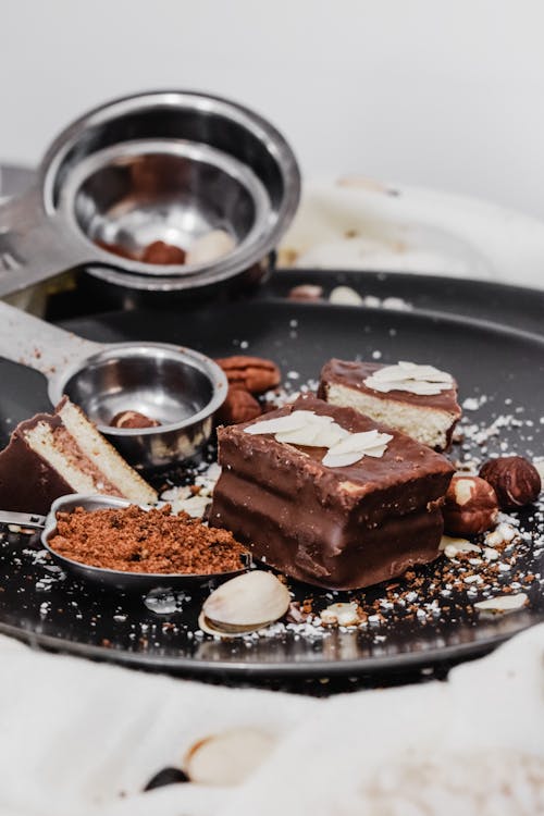 Chocolate Cake With Nuts on a Ceramic Plate