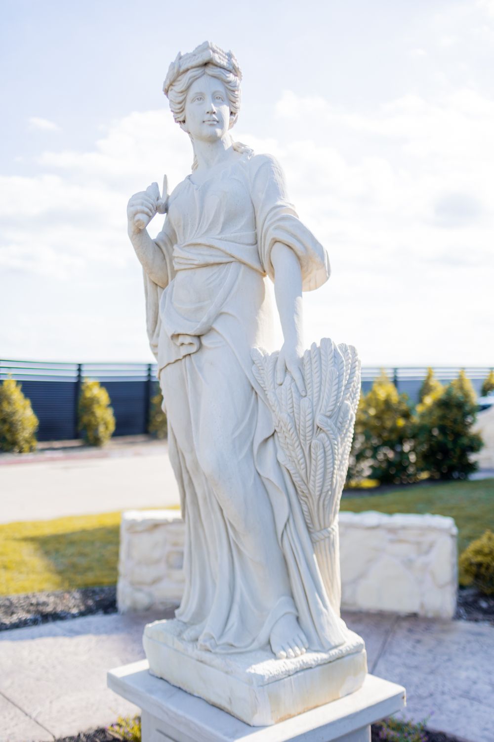 A Statue of a Woman in the Garden · Free Stock Photo