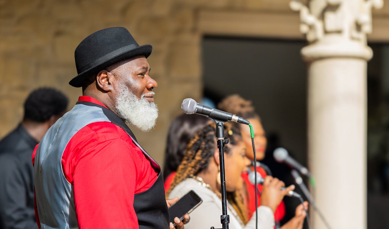 Man in Red Shirt Singing